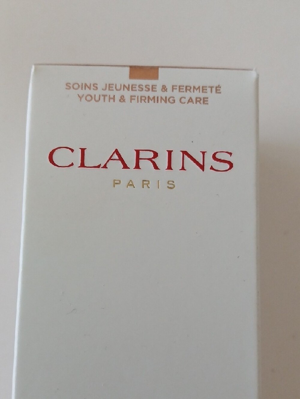 Clarins Extra-Firming Neck & Décolleté Cream - White with Rose Gold Accents - Picture 2 of 6